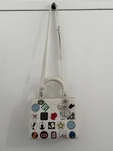 Dior Medium Lady Dior, White Calfskin, bought and authenticated by San Diego Jewelry Buyers