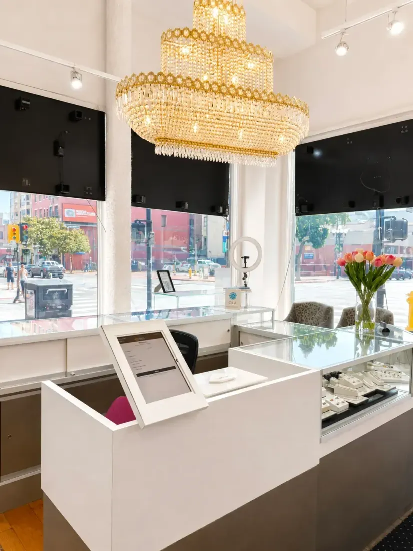 The buying counter and jewelry showcases inside the showroom